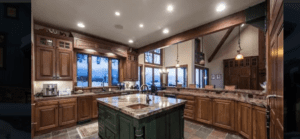 a big kitchen with a center countertop